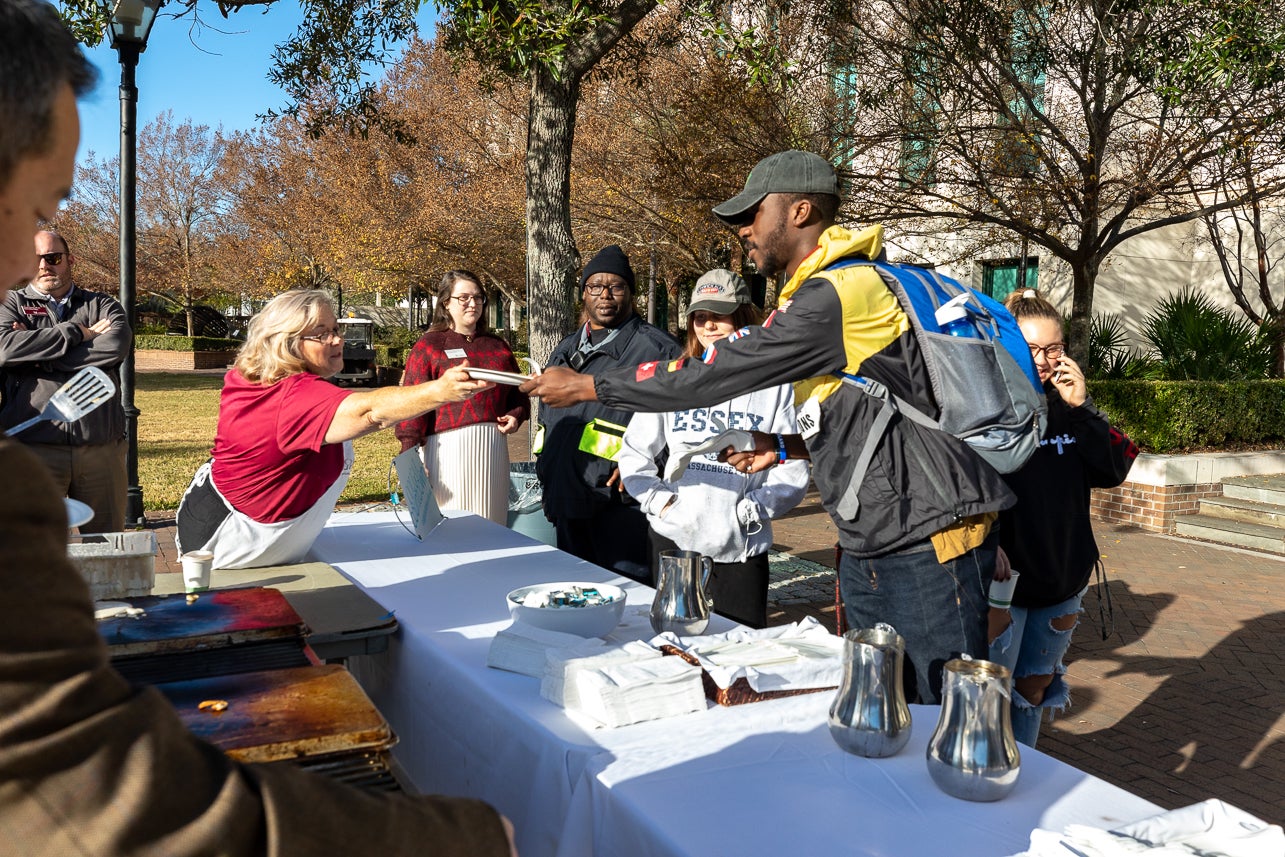 20191206President Hsu and other staff members spent Friday morning December 6, 2019 on River's Green making pancakes for students, staff and faculty. Pancakes With The President
