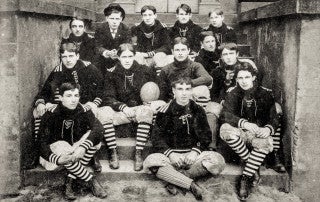 The 1897 College of Charleston Football Team on the steps of the Towell Library. Top row: Mazyck, O'Driscoll, Fogarty, Bull, O'Bryan. Middle Row: Marshall, Randolph, Chestnut, Holmes, Benet. Bottome ro: Sparkman, Boykin, Johnson