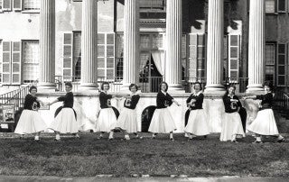 1958 Cheerleaders on the Cistern in front of Randolph Hall.