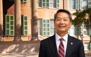 President Andrew Hsu stands in front of randolph hall