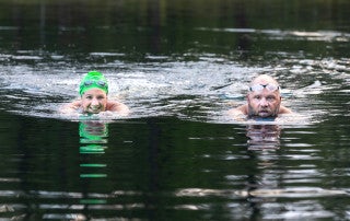 Brian Lanahan and Sara Stevenson swim at Trophy Lakes