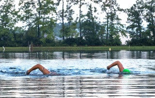 Brian Lanahan and Sara Stevenson swim at Trophy Lakes