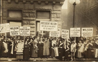 National Woman's Party members picket outside the International Amphitheater in Chicago, where Woodrow Wilson delivers a speech on Oct. 20, 1916.