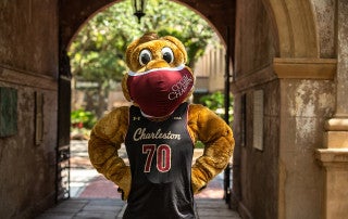 Clyde the Cougar wears a mask for the Cougar Pledge at the College of Charleston.