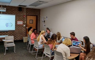 students interact with native spanish speakers online in a globally connected course