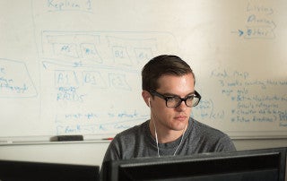 a student does work at a computer