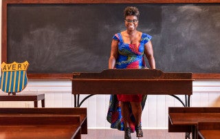 Tamara T. Butler the new Executive Director of the Avery Research Center for African American History and Culture at the College of Charleston and Associate Dean of College Libraries stands at the front of the classroom set-up on the second floor of the Avery.