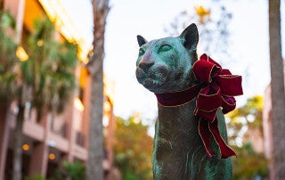 Holiday Cougar Statue