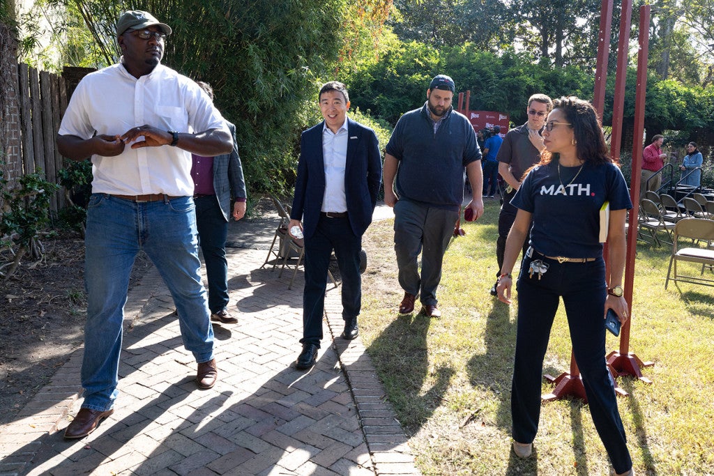 jermaine johnson with andrew yang during a visit to cofc in 2019