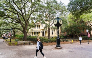 students walking on the cofc campus