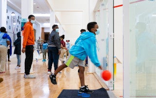 Kids participate in activities during a Kids on Point after school program at Johnson gym, College of Charleston.