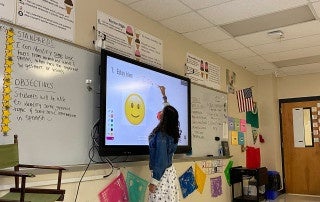 Martina Abbriano teaches Spanish in a classroom