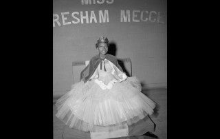 A black and white photo of the Gresham-Meggett School Homecoming Queen