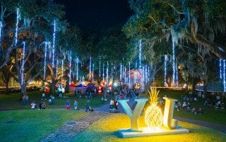 Students celebrate the holidays at Cougar Night Lights, Cistern Yard, College of Charleston.