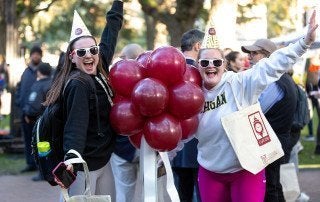people celebrating cofc day