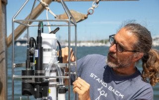 gorka sancho inspects research equipment