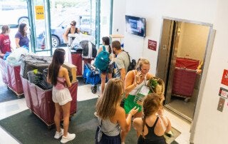 students move into a residence hall at cofc