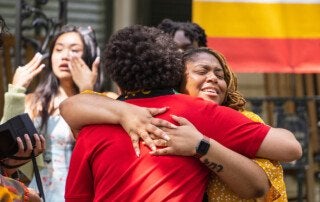 Multicultural Graduation Celebration hugs